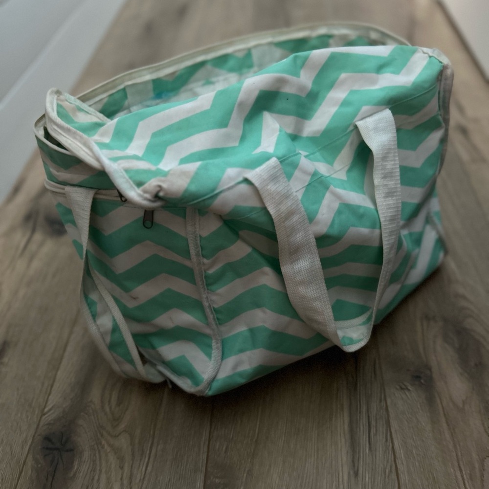 Colorful striped beach bag with vinyl liner
Approx 18 in x 12 in